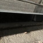 Premium Black Galaxy Granite slab with golden specks and polished finish